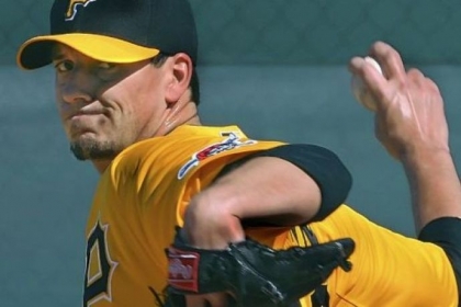 Charlie Morton throws off the mound Monday at Pirate City in Bradenton, Fla. Morton faced hitters for the first time since May 29 when he was injured and had Tommy John surgery.