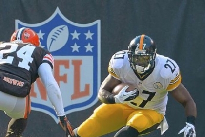 Jonathan Dwyer moves up the field on the Browns' Sheldon Brown during a November game.