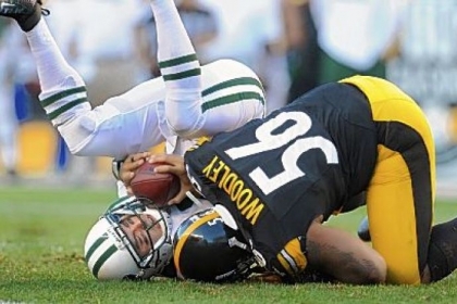 Steelers linebacker LaMarr Woodley sacks Jets quarterback Mark Sanchez during a game last season.