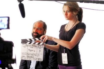 Franco Harris being interviewed in January 2012 for the Joe Paterno movie, "The Joe We Know." About 70 former Penn State football players had their memories of  Paterno taped for the film. At right is Grace Leri, who helped in the production.