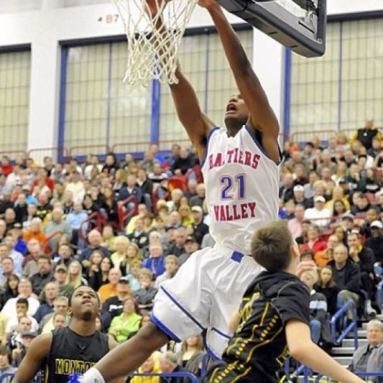 Chartiers Valley's Spencer Casson dunks against Montour during the WPIAL Class AAA championship game.