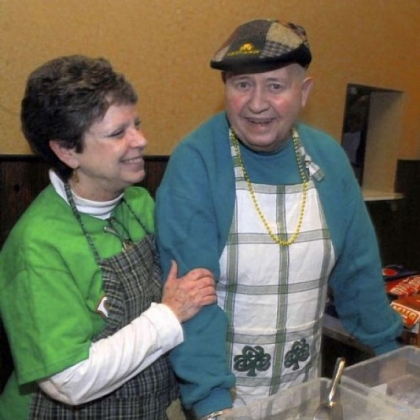 Maureen Donnelly of Heidelberg, left, kids with Mickey Abbott of Scott at the fish fry at the Ukrainian American Club in Carnegie.
