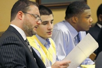 From left, defense lawyer Adam Nemann looks over evidence with defendant Trent Mays, 17, center, sitting next to defendant Malik Richmond, 17, during the trial in Steubenville on Thursday.