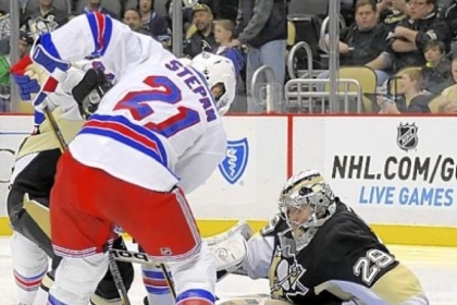 Marc-Andre Fleury stops New York's Derek Stepan in the second period - one of his 23 saves - en route to his franchise-record 23rd career shutout at Consol Energy Center.