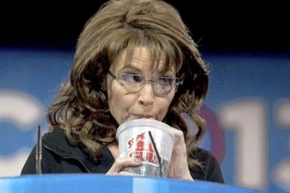 Former Alaska Gov. Sarah Palin drinks from a 7-Eleven Super Big Gulp on stage while speaking at the 40th annual Conservative Political Action Conference in National Harbor, Md., Saturday. Earlier in the week, a New York judge struck down a ban proposed by New York Mayor Michael Bloomberg to end the sale of sugared sodas larger than 16 ounces.