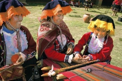Three generations of weavers attending one of the weekly Saturday CTTC (Center for Traditional Textiles in Cusco) meetings in Chahuaytire, Peru.