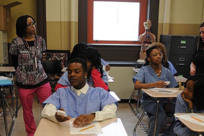 Tia Ellis, a health careers teacher, and Darcy Tyhonas, an English teacher at Pittsburgh Perry, team up to improve test scores.
