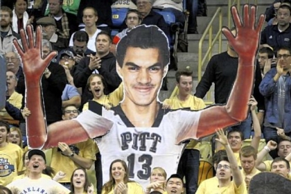 The puppet cutout - the brainchild of two Pitt students in the Oakland Zoo - was popular "garnish" for the visiting TV team.
