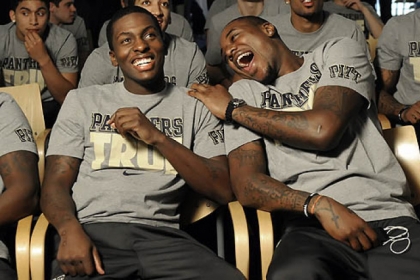Tray Woodall and Dante Taylor joke at the Petersen Events Center Sunday as they wait to see what their team's seeding will be in the NCAA tournament.