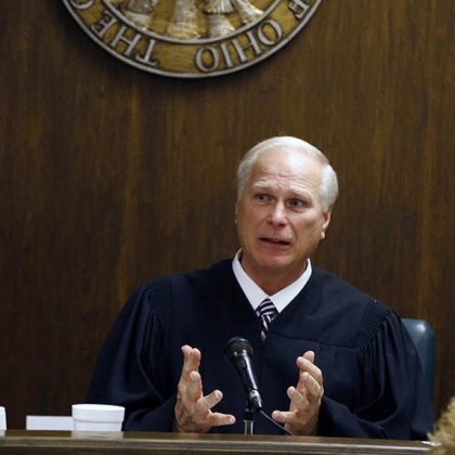 Judge Thomas Lipps talks from the bench to the families of Trent Mays and Malik Richmond after he pronounced them delinquent for rape.
