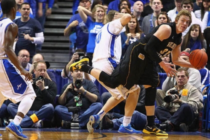 Wichita State freshman Ron Baker, right, with the ball, missed 21 games with a stress fracture in his foot but returned for the Missouri Valley Conference tournament and scored 29 points in three games.