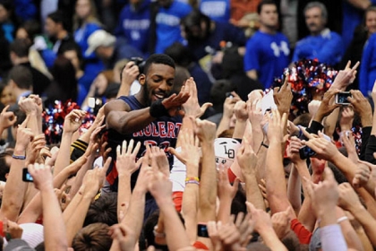 Robert Morris' Lucky Jones is lifted on top of the shoulders of the crowd after defeating Kentucky in the first round of the NIT.