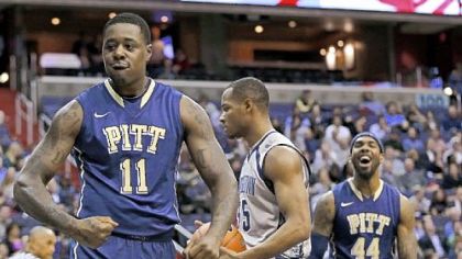 Dante Taylor celebrates a basket in the first half Tuesday night against Georgetown in Washington.