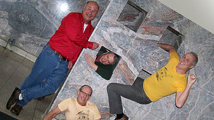 In their pose are Mike Forbeck of Verona, front; Gary Free of Philadelphia, right; Jim Fornof of Ashburn, Va., left; and Dan O'Connor of Battle Creek, Mich., center.