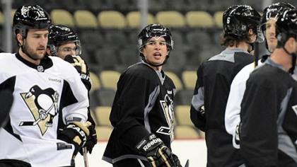 Sidney Crosby leads an informal practice on Tuesday at the Consol Energy Center. The players have held workouts since the NHL lockout began in September, but this marked the first time they were allowed into their home arena.