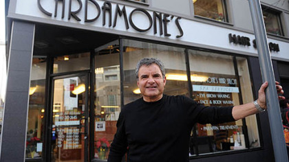 Joe Cardamone, owner of Cardamones Hair Salon, shows off his shop, one of several buildings that participated in the Pittsburgh Downtown Partnerships Paris to Pittsburgh Facade Grant Program, on Forbes Avenue in Downtown Pittsburgh.      