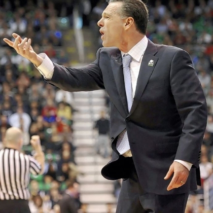 Pitt coach Jamie Dixon questions a call in the second half of his team's loss to Wichita State Thursday at EnergySolutions Arena in Salt Lake City.