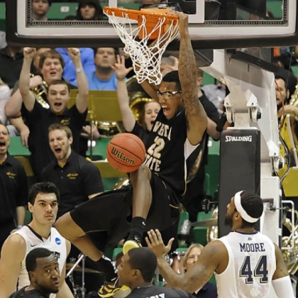 Wichita State's Carl Hall dunks against Pitt in the second half of the second round of the NCAA tournament at EnergySolutions Arena. Wichita State knocked Pitt out of the tournament with a 73-55 victory.