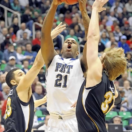 Pitt's Lamar Patterson draws contact from Wichita State players Thursday in Salt Lake City.