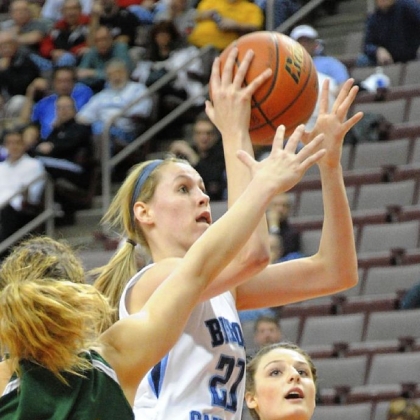 Bishop Canevin Erin Waskowiak goes up for a basket as York Catholic Zaenna Echevarria defends in the first half of the PIAA AA Girls basketball championship Friday at Giant Center in Hershey, Pa. Bishop Canevin won 45-38.