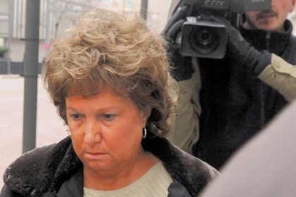 Suspended police finance manager Sandra J. Ganster walks along Grant Street, Downtown, after appearing at the Federal Courthouse on Friday morning.
