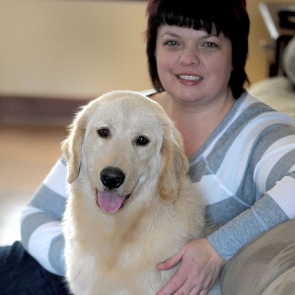 Marcy Kronz with Dudley, whose rigid rear legs are undergoing rehabilitation.