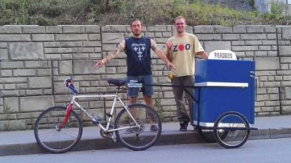 Thomas Guentner, 33, of the South Side Slopes and Jeff Newman, 29, of Braddock Hills with their pierogi delivery cart.

